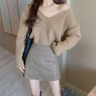 Long-sleeve V-neck Plain Sweater / Faux Leather Mini Skirt