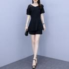 Set: Short-sleeve Peplum Blouse + Wide-leg Shorts