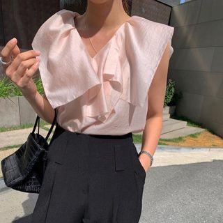 Asymmetrical Ruffled Sleeveless Blouse