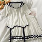 Set: Tie-accent Sailor-collar Knit Top + Pleated Mini Skirt
