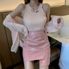 Sleeveless Knit Top / Patent Mini Fitted Skirt / Light Cardigan