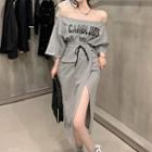 Set: Long-sleeve Lettering Off-shoulder T-shirt + Midi Skirt
