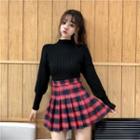 Plain Mock-neck Sweater / Plaid Mini A-line Skirt