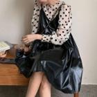 Round-neck Dotted Long-sleeve Top / Faux Leather A-line Suspender Skirt
