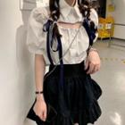 Puff-sleeve Cutout Shirt / Mini A-line Skirt