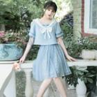 Set: Short-sleeve Bow-accent Blouse + A-line Skirt