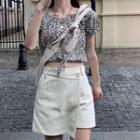 High-waist Asymmetric Plain Skort / Contrast Trim Lettering Cropped T-shirt / Short-sleeve Tie-waist Leopard Top