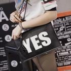 Letter Tasseled Clutch