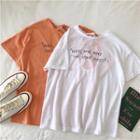 Lettering Open-back Loose-fit Short-sleeve T-shirt