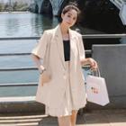 Set: Short Sleeve Two Button Loose Blazer + Pleated Mini Skirt