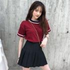 Short-sleeve Contrast Trim T-shirt / A-line Mini Pleated Skirt