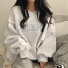 Round-neck Loose-fit Lettering Embroidered Sweatshirt