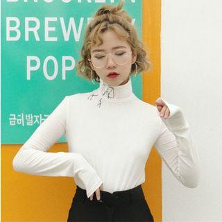 Long-sleeve Turtleneck Face Print Top