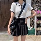 Contrast Trim Short-sleeve Knit Polo Shirt / Pleated Skirt