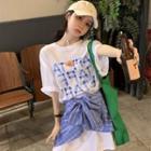 Short-sleeve Lettering Print T-shirt / Tie-strap Plaid Mini Skirt