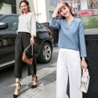 Set: Long-sleeve Plain Top + Wide-leg Cropped Pants