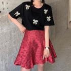 Elbow-sleeve Bow Accent T-shirt / Patterned A-line Skirt