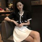 Set: Contrast Trim Short-sleeve Knit Top + High Waist Pleated Skirt