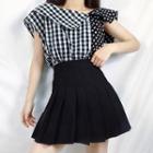Pattern Short-sleeve Asymmetrical Blouse / High-waist Pleated Skirt