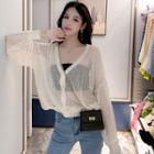 Long-sleeve Perforated Buttoned Knit Top
