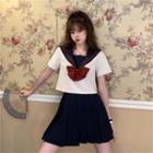 Sailor Collared Short-sleeve Top / Pleated Skirt