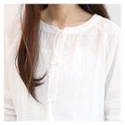 Tassel-neck Perforated-trim Blouse