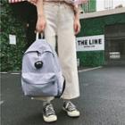 Pom Pom Accent Backpack