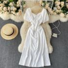 Short-sleeve V-neck Open-back Embossed Floral Dress