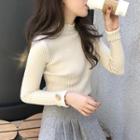 Ruffle Knit Long-sleeve Top