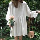 Long-sleeve Ruffle-hem Shift Dress