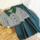 Set: Plaid Short-sleeve Blouse + Midi A-line Skirt