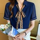 Dotted Tie-neck Short-sleeve Blouse