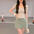 U-neck Round Hem Crop Top / High Waist Drawstring Mini Skirt