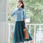 Set: Mandarin Collar Elbow-sleeve Top + Midi A-line Skirt