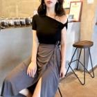 Plain Asymmetric Off-shoulder Short-sleeve Top / High-waist Lace-up Skirt