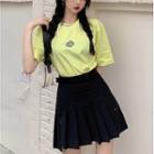 Elbow-sleeve T-shirt / Pleated Mini A-line Skirt