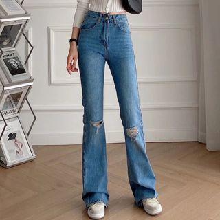 Mid Rise Bootcut Distressed Jeans
