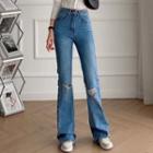 Mid Rise Bootcut Distressed Jeans