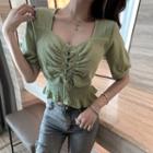 Short-sleeve Lace-up Peplum Blouse