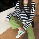 Long-sleeve Striped T-shirt / Wide-leg Dress Pants