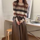 Long-sleeve Striped Knit Top / High-waist Plain Faux Leather Skirt