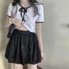 Short-sleeve Open-back Top / Dotted A-line Mini Skirt