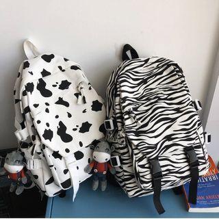 Printed Buckled Canvas Backpack