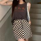 Floral Embroidered Tank Top / Checkerboard Mini Pencil Skirt