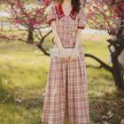 Set: Short-sleeve Plaid Double-breasted Top + Midi A-line Skirt