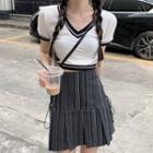 Short-sleeve Contrast Trim Cropped T-shirt / High-waist Striped Lace-up Pleated Mini Skirt