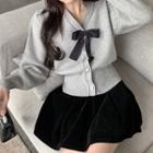 V-neck Bow Cardigan / Mini A-line Skirt