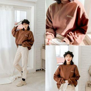 Attitude Mock-neck Embroidered Pullover