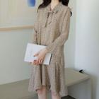 Tie-neck Ruffle-hem Pattern Midi Dress