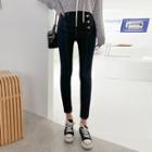 Asymmetric-button Stitched Skinny Jeans